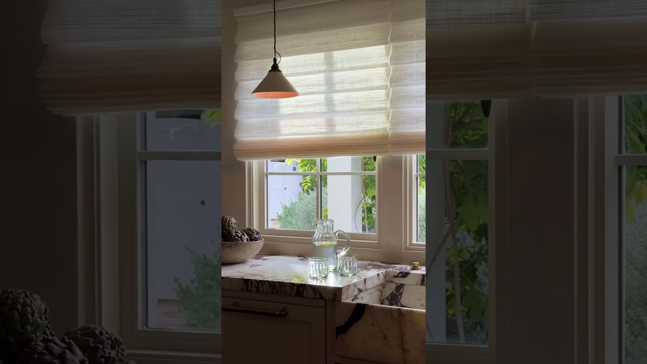 Hunter Douglas Vignette Modern Roman Shades in a kitchen