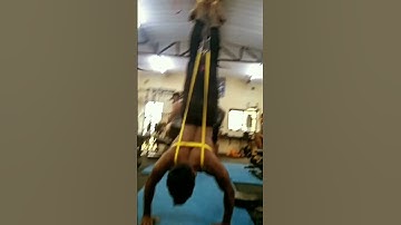 Assisted handstand push ups with resistance band.#fitness #gym#body #fitnessmotivation  #aaofir