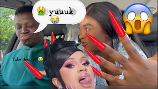 picking up my husband with extremely long cardi B nails to see his reaction*hilarious *