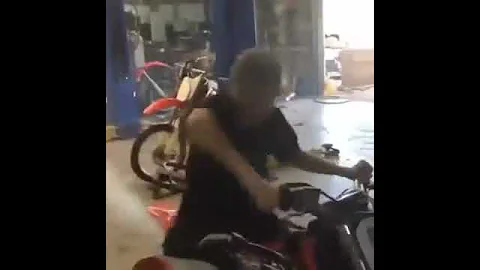 Crazy Guy on 2 stroke Dirt Bike