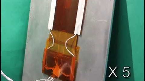 ultrathin Inchworm robot using electrostatic film actuators climbs up a slope