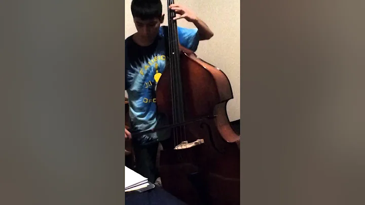 Jesse Aquino playing the bass