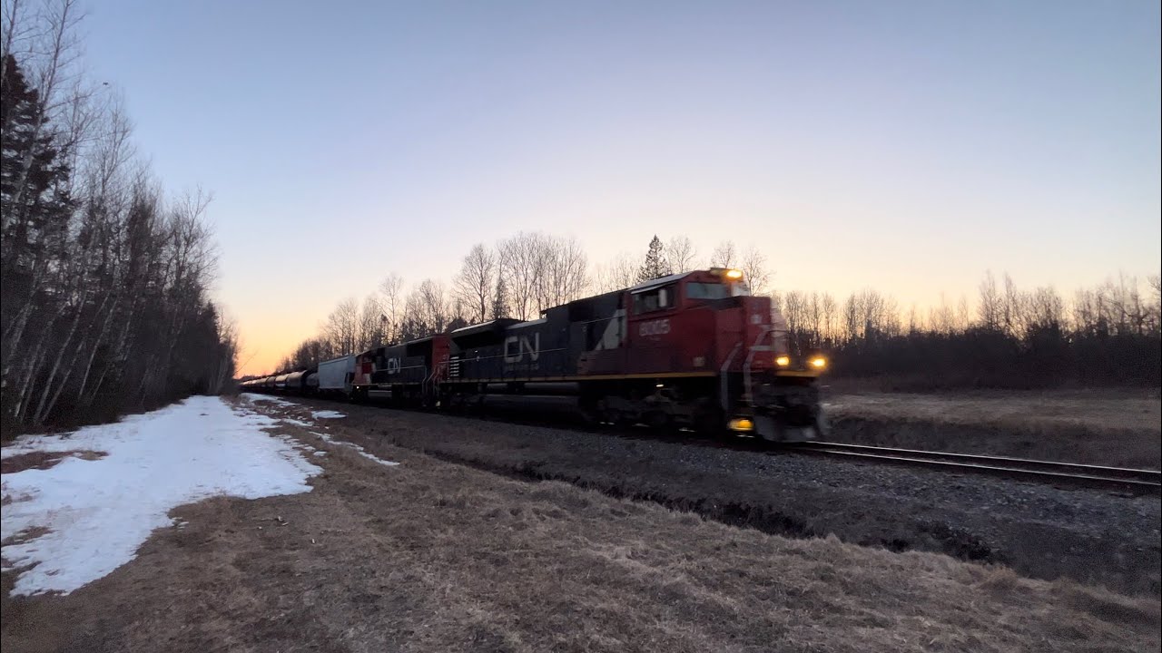 High Headlight SD70M2 Leads CN Train 594 West at Plumweseep, NB at