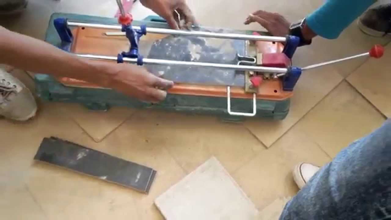 قطع السيراميك بواسطة ماكينة القطع - YouTube