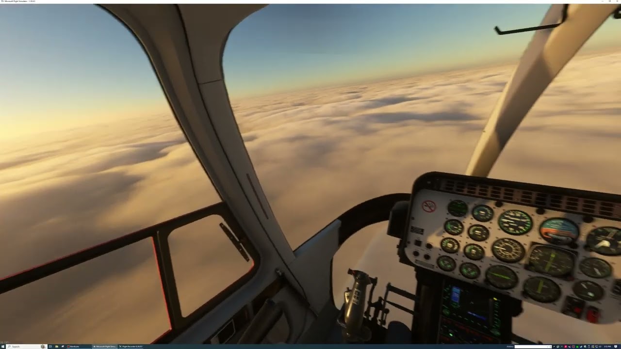 The Almaty TV Tower, Peeks Out From The Fog, As A Bell 407, Flies Around It & Lands At (UAAA).