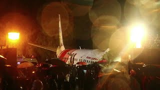 At least 17 killed in Air India flight crash