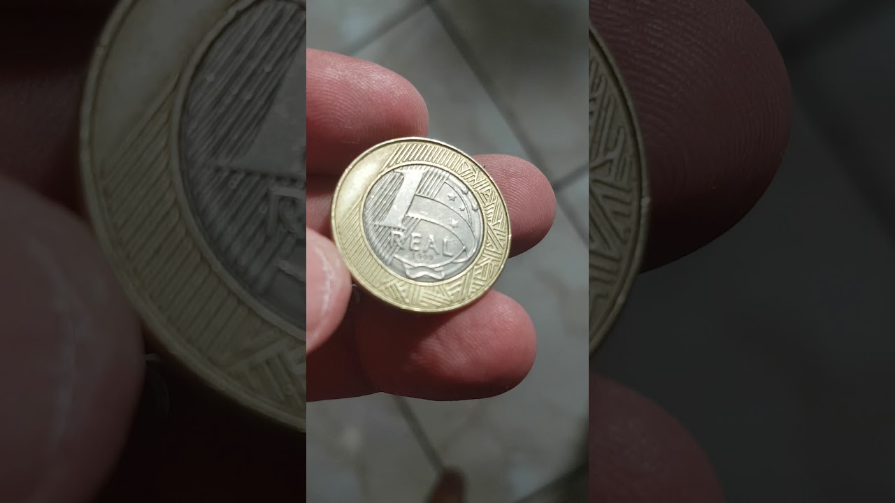 Moeda de 1 real 1999 com anomalias 