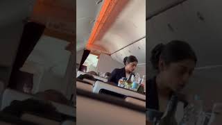 Air Hostess Serving At 30,000 Feet