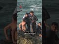 Thousands of migrants overwhelm police at Spanish territory's border