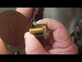 Making fine lacing out of small circles of leather using your Aussie strander.