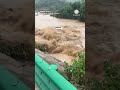 Car Falls Into Raging River After Bridge Gives Way
