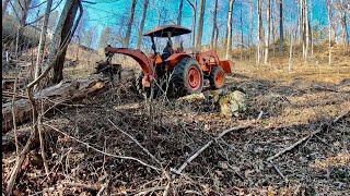 So Called LIGHT WEIGHT KUBOTA skidding logs on Steep Rocky Ground!