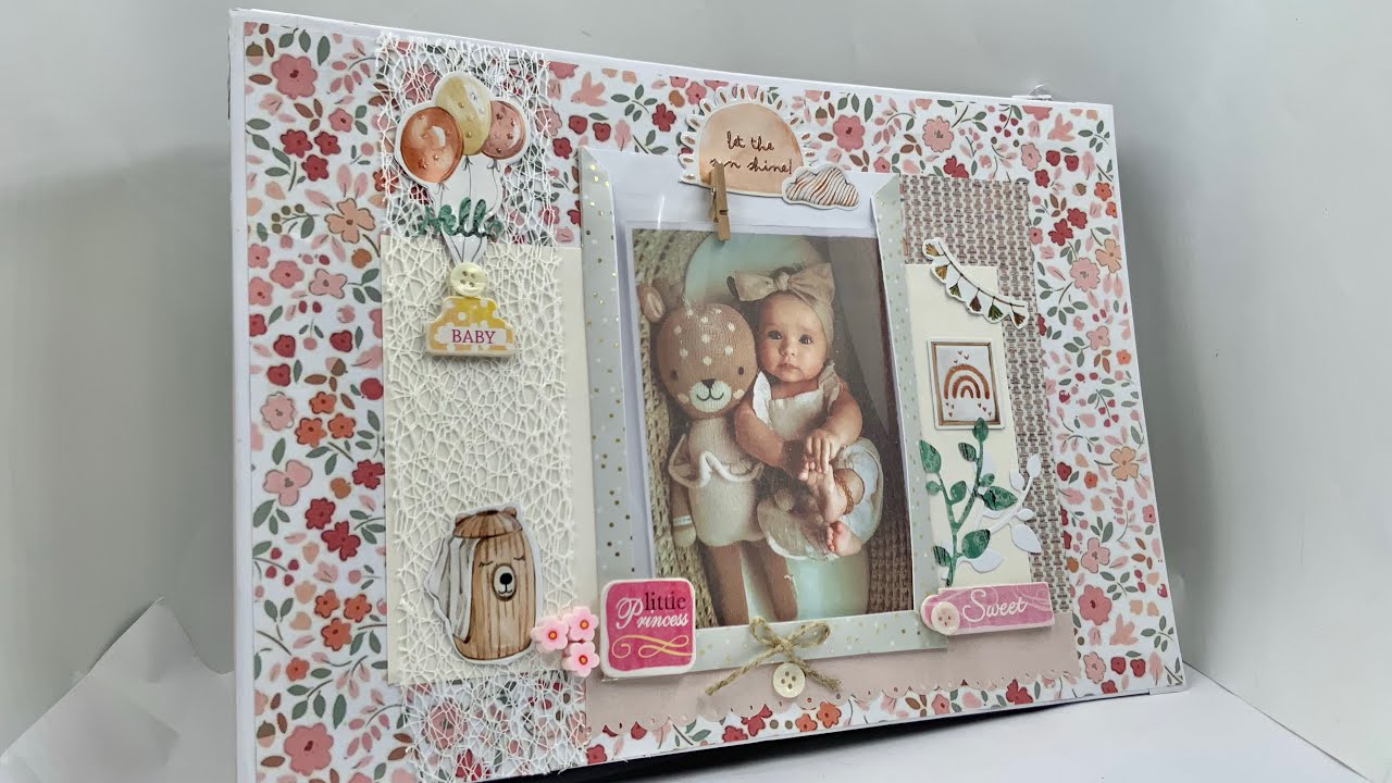 Album scrapbooking pour photos de la première année de bebe ( à vendre)