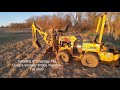 Installing Drainage Tile with Vermeer V430A Trencher