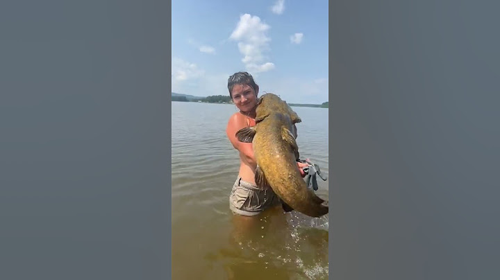 noodling catfish with Hannah Barron outdoors