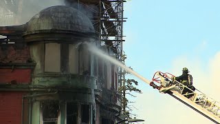1 dead, 2 missing after fire rips through rooming house