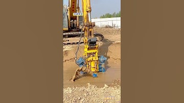 The image shows a Sumitomo excavator equipped with a rotary cutter head dredging or desilting