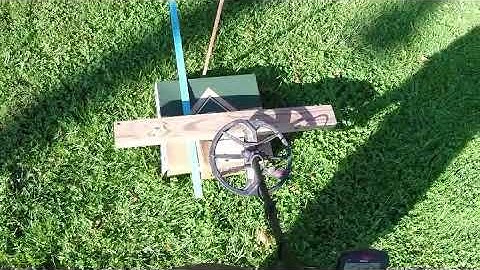 Minelab Equinox 800 detecting dime near iron pole