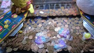 2p coin pusher - £3.00, win