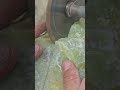 cutting a piece of jade according to the desired shape using a cutting tool#trending