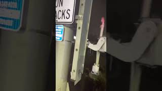 New Jersey transit passing Market St Railroad Crossing in Hackensack New Jersey