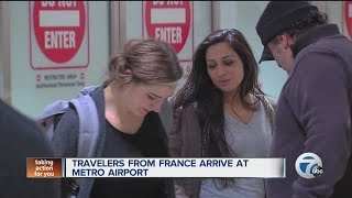 Travelers from France arrive at Detroit Metro Airport