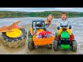 Darius and Francesca saved the tractor wheel from the mud and fed with candies the crocodile