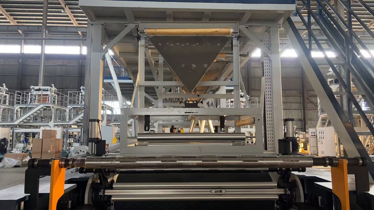 1200MM HDPE THREE LAYER FILM BLOWING MACHINE WITH IBC SYSTEM AND UP ROTATION TOWER