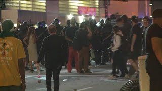 Atlanta officers respond with tear gas after protesters throw bottles, other objects them