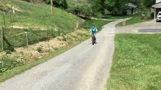 My friend does a Wheelie on his bike