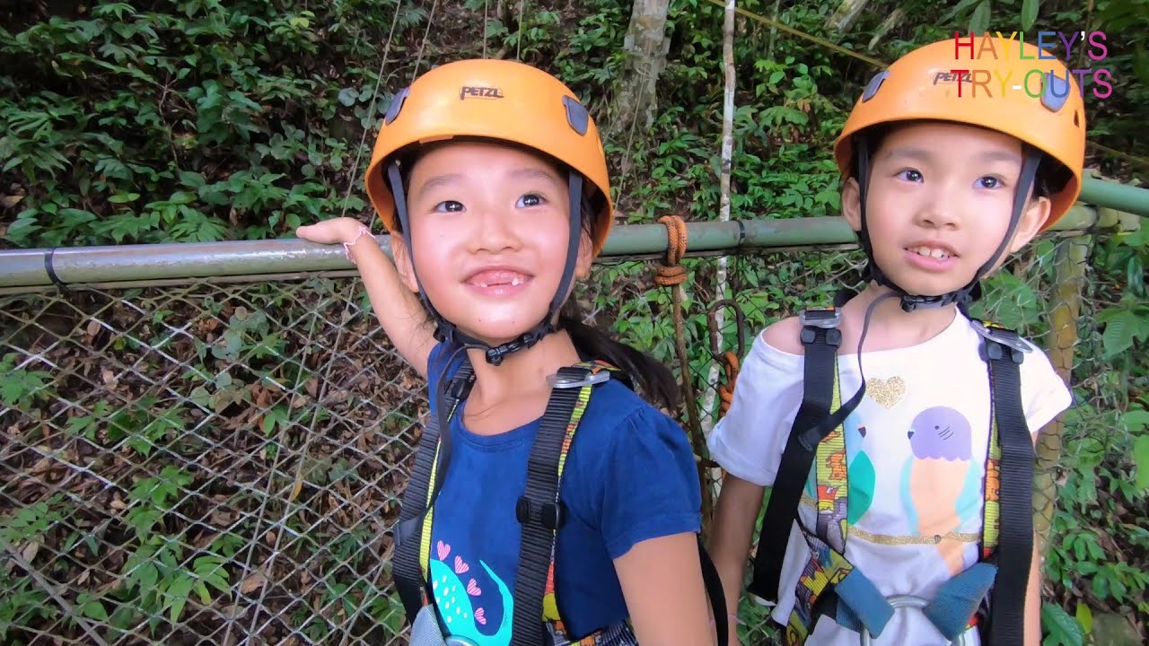 Kids can do flying fox (zip line) and water rafting in Sabah, Malaysian Borneo.