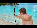 Survival bowfishing catch and cook in paradise