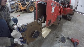 Fixing a stump grinder and grinding some stumps.