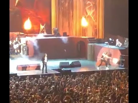 Iron Maiden's Janick Gers accidentally throws guitar into the crowd in Texas..