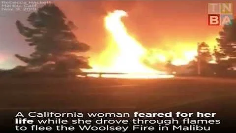 Rebecca Hackett drives through Flames