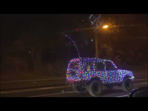 Does Santa have a new ride? Fairy light festooned Land Rover brings cheer to the M25