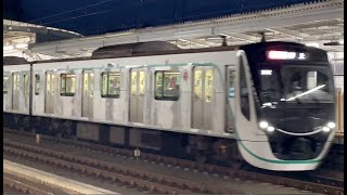 高津駅（DT09）４番線を急行押上行きの東急2020系2124Fが通過する