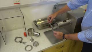 How Do I Assemble My Axial Die Configuration On The Caleva Variable Density Extruder?