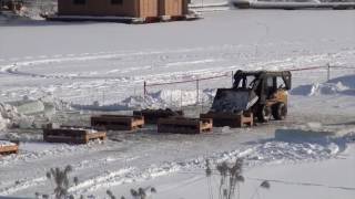 Ed and crew working on the rock cribs for the new dock at Blue Water Acres, South Portage, Lake of Bays during the winter of 2013.