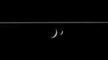 Enceladus Transits Rhea