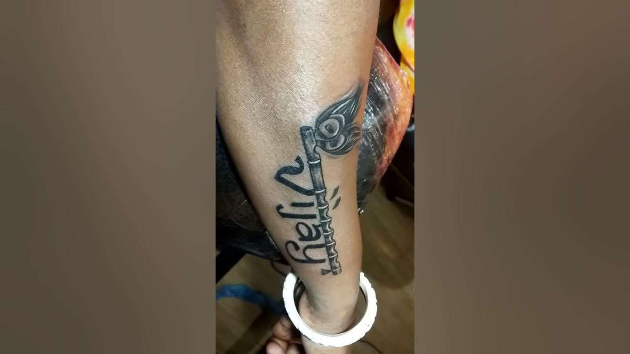 Vijay Name Tattoo | Name tattoo with Flute and peacock feather ...