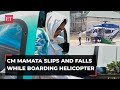 Cm mamata banerjee falls while taking a seat after boarding her helicopter in durgapur