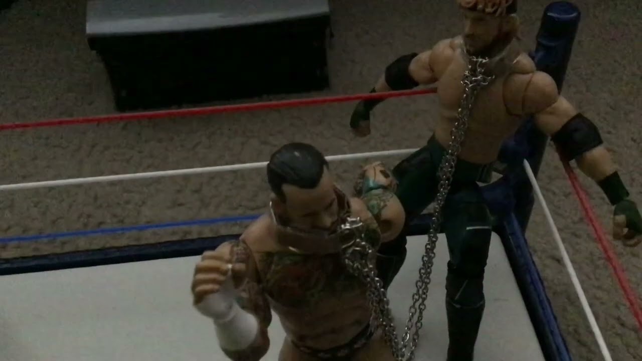 Logan Paul vs CM Punk WWE figure dog collar match