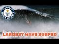 Man breaks the Guinness World Record for surfing the largest wave