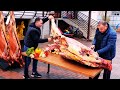 Enormes canales de carne preparados por carnicero | Carne de cordero joven a la parrilla