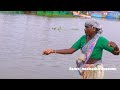 Fishing in India | old woman catching cat fish from  saltwater river