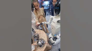 Gitex Dubai 2025: Schokkende AI-koffiezetapparaatrobot van TISROBOT China