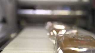 PACK EXPO 2014 - Rose Forgrove Merlin Blu Flow Wrapper