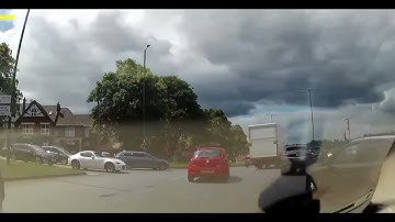How not to exit a roundabout and why. Two drivers versus reality.