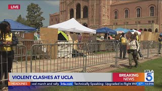 UCLA cancels classes after night of violence over pro-Palestinian encampment